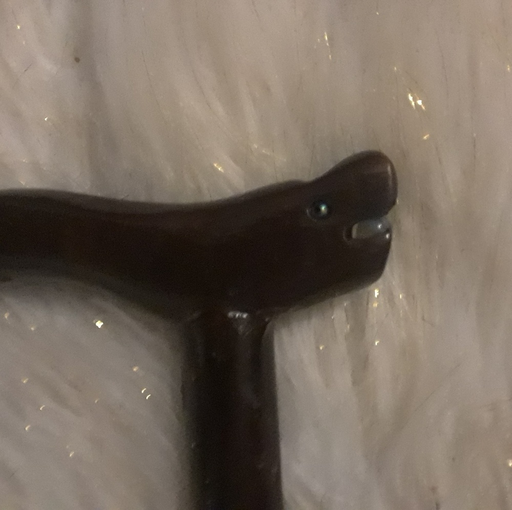 Decorative  wooden cane with face 4.5 feet tall